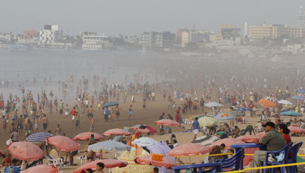 People gather at the beach during a heat wave in Casablanca